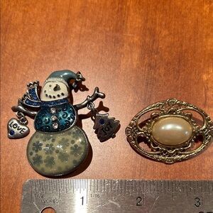 2 pins One Christmas one pearl & gold From Christopher Banks perfect condition